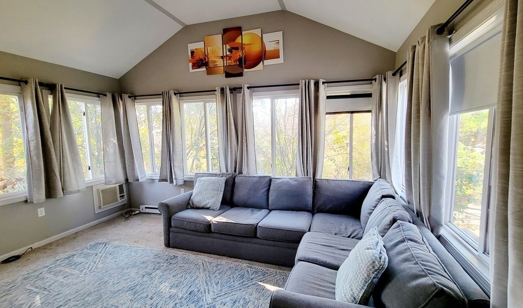 11 North Martin Road Amesbury, MA 01913 - Photo 8 of 28 a living room with furniture and a large window