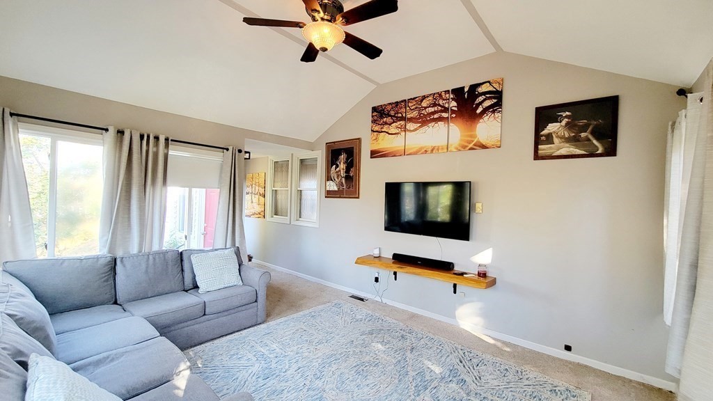 11 North Martin Road Amesbury, MA 01913 - Photo 9 of 28 a living room with furniture and a flat screen tv