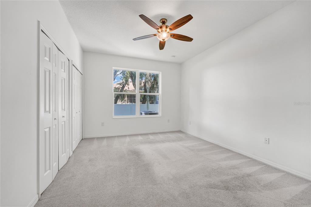 4824 Poolside Drive St. Cloud, FL 34769 - Photo 12 of 29 an empty room that has a window