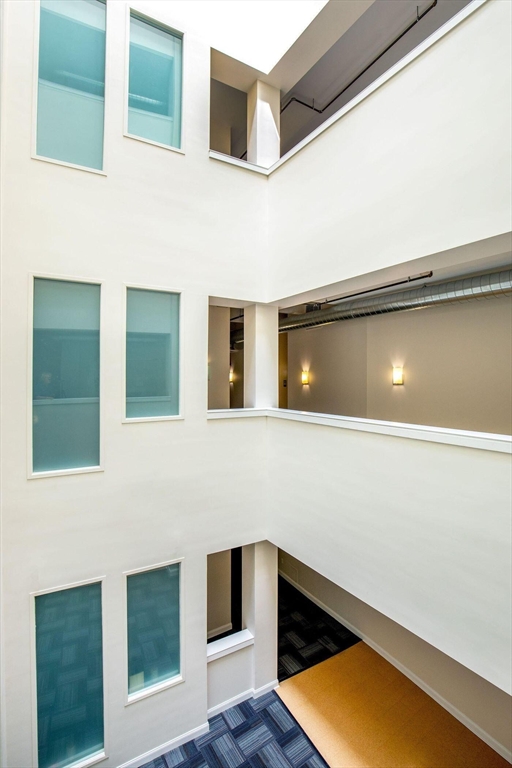 51 Lafayette Street, Unit 403 Salem, MA 01970 - Photo 12 of 13 a backyard of a house with seating space