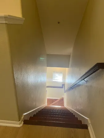 a view of backyard with seating space