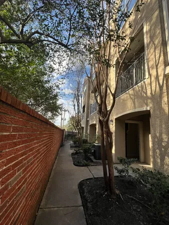 a front view of a house with yard