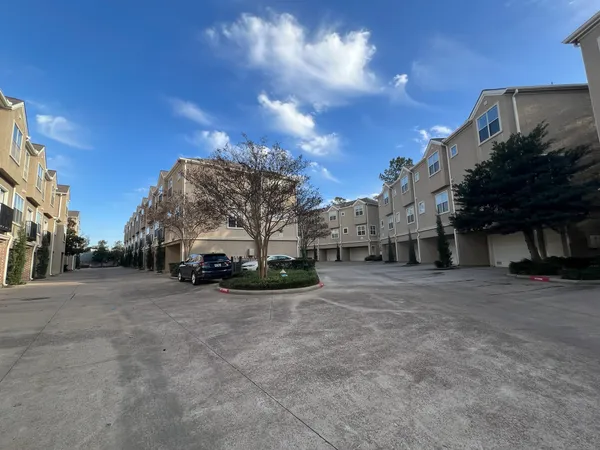 a view of road and trees