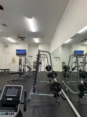 a view of a room with gym equipment