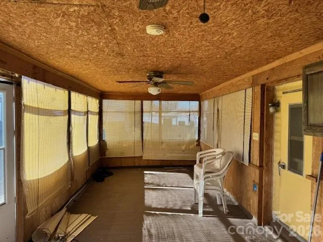 a view of a room with a large window