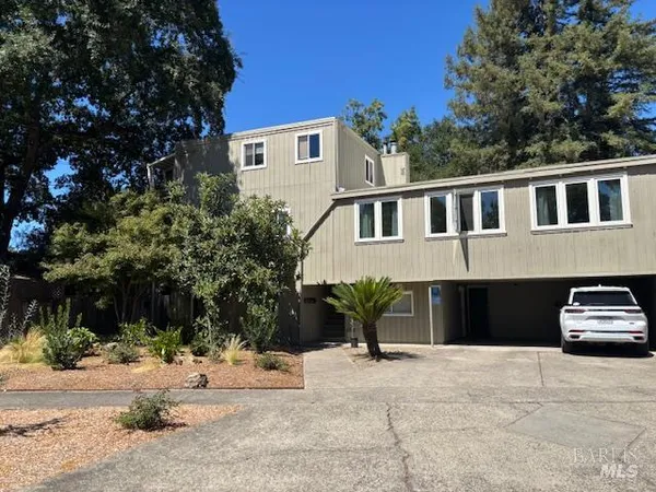 a house view with a outdoor space