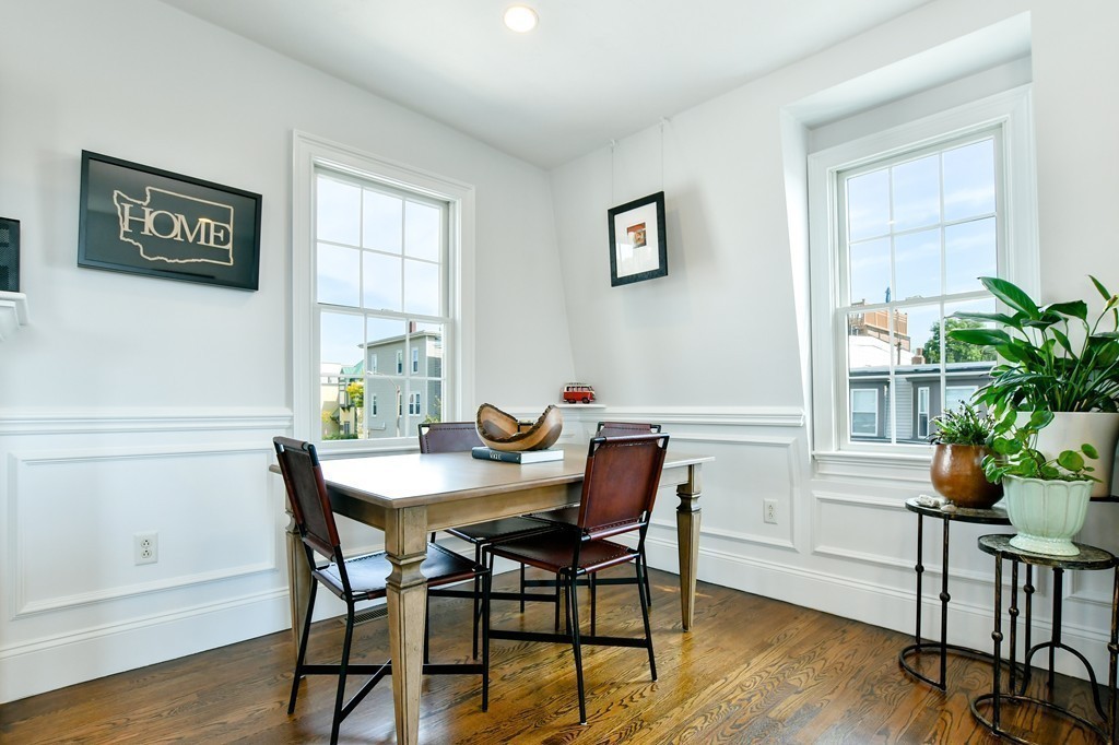 155 H Street, Unit 2 Boston, MA 02127 - Photo 5 of 20 a view of a dining room with furniture and wooden floor