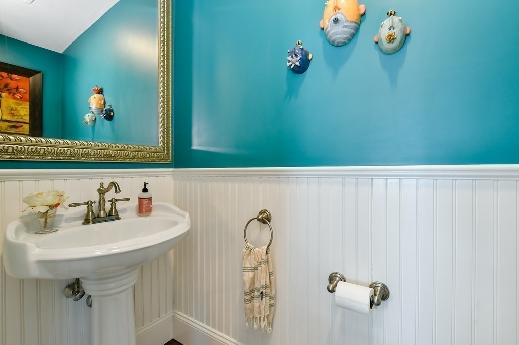 155 H Street, Unit 2 Boston, MA 02127 - Photo 9 of 20 a bathroom with a sink and mirror