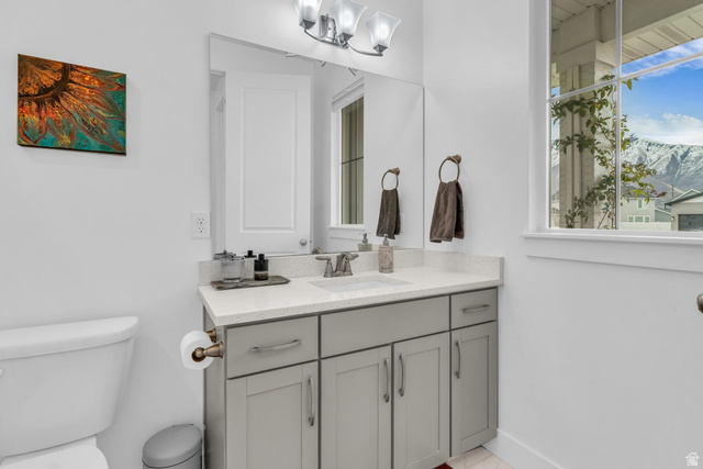 2454 West Jackson Street Mapleton, UT 84664 - Photo 28 of 63 Bathroom featuring vanity and hanging lights