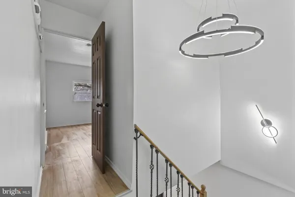 a view of a livingroom from a hallway