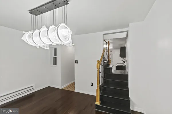 a view of entryway with wooden floor