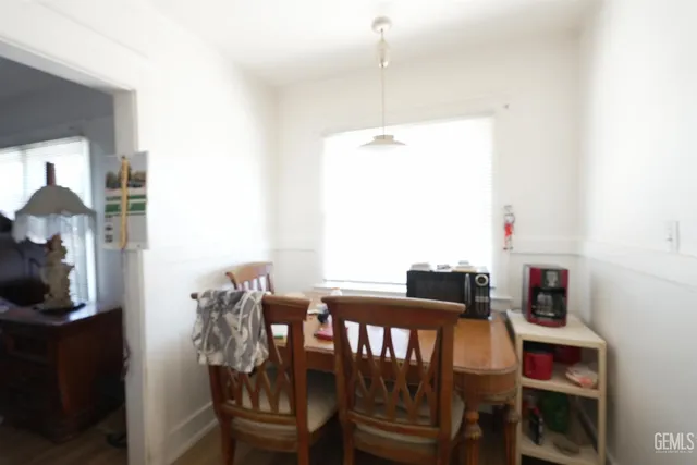 a utility room with sink dryer and washer
