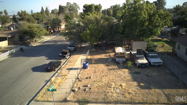 an aerial view of a house with outdoor space