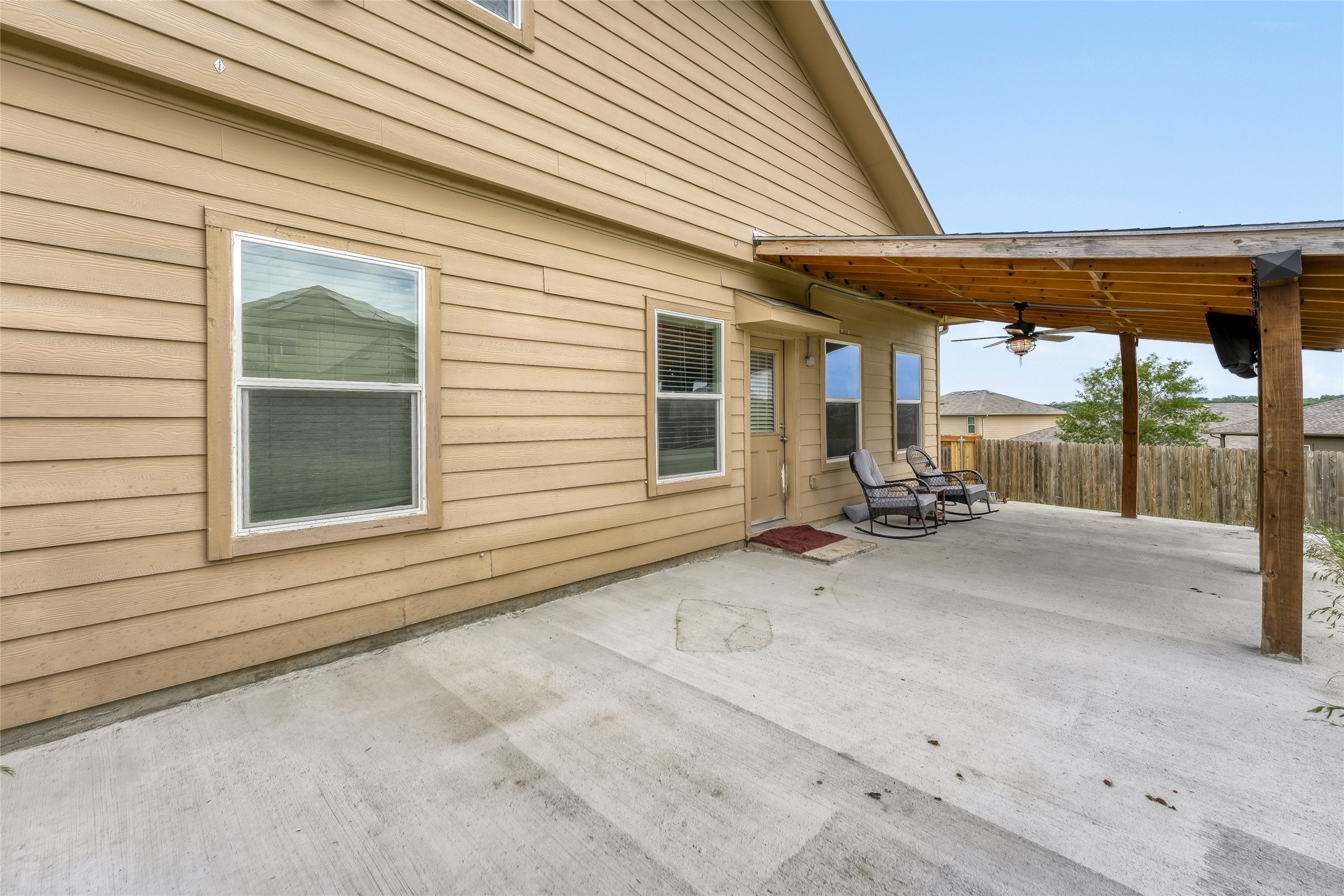 15105 Shell Bark Cove Austin, TX 78724 - Photo 25 of 30 A spacious covered patio invites relaxation and outdoor enjoyment.