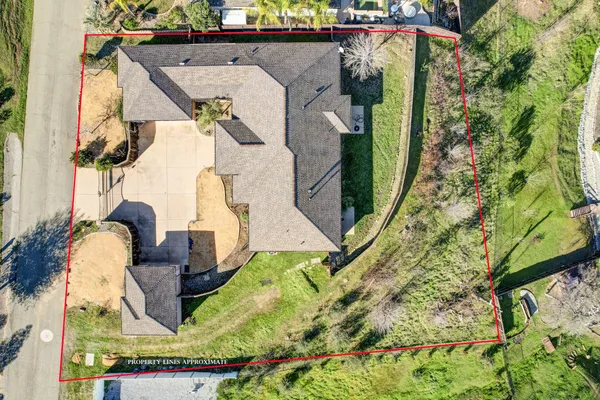 an aerial view of a house with garden