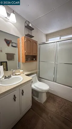 a spacious bathroom with a tub and shower
