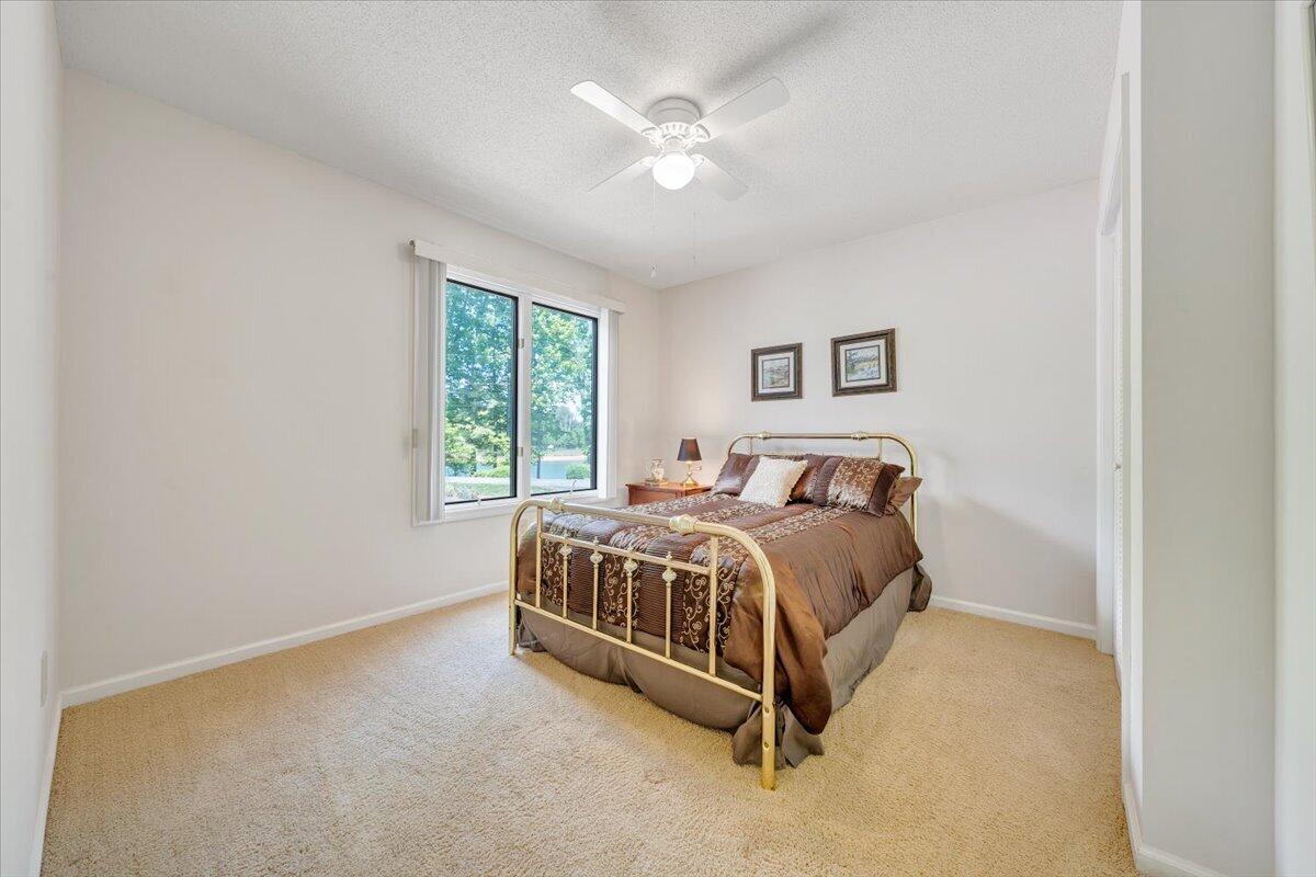 620 Monte Vista Road, Unit 602 Union Hall, VA 24176 - Photo 19 of 48 a bed sitting in a spacious bedroom next to a window