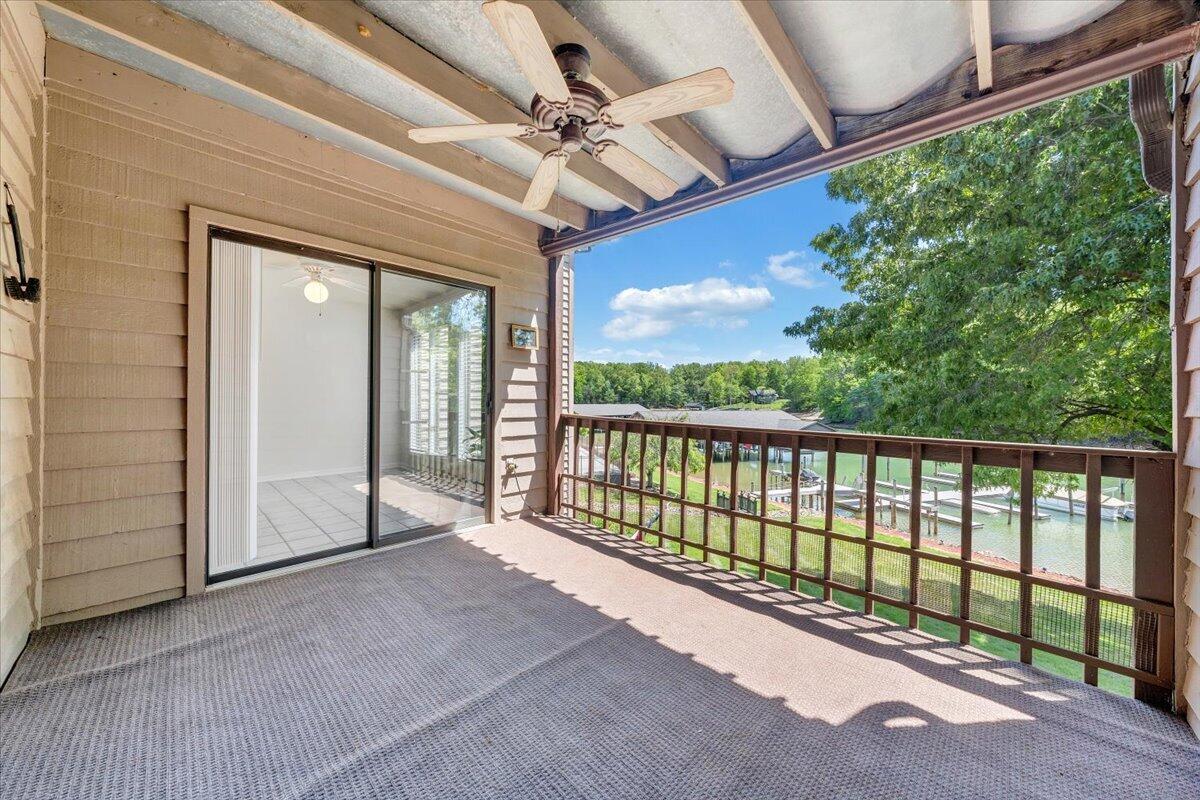 620 Monte Vista Road, Unit 602 Union Hall, VA 24176 - Photo 23 of 48 a view of a porch with furniture and a floor to ceiling window