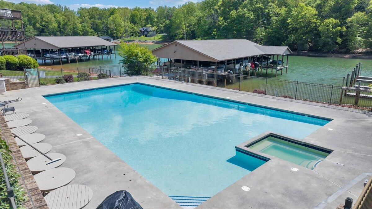 620 Monte Vista Road, Unit 602 Union Hall, VA 24176 - Photo 39 of 48 a view of a swimming pool with lawn chairs and a yard