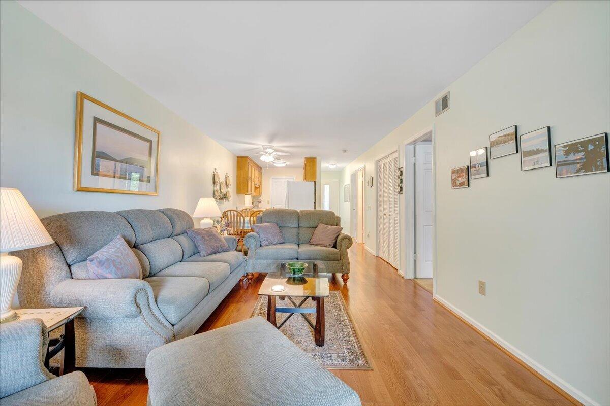 620 Monte Vista Road, Unit 602 Union Hall, VA 24176 - Photo 9 of 48 a living room with furniture and a wooden floor