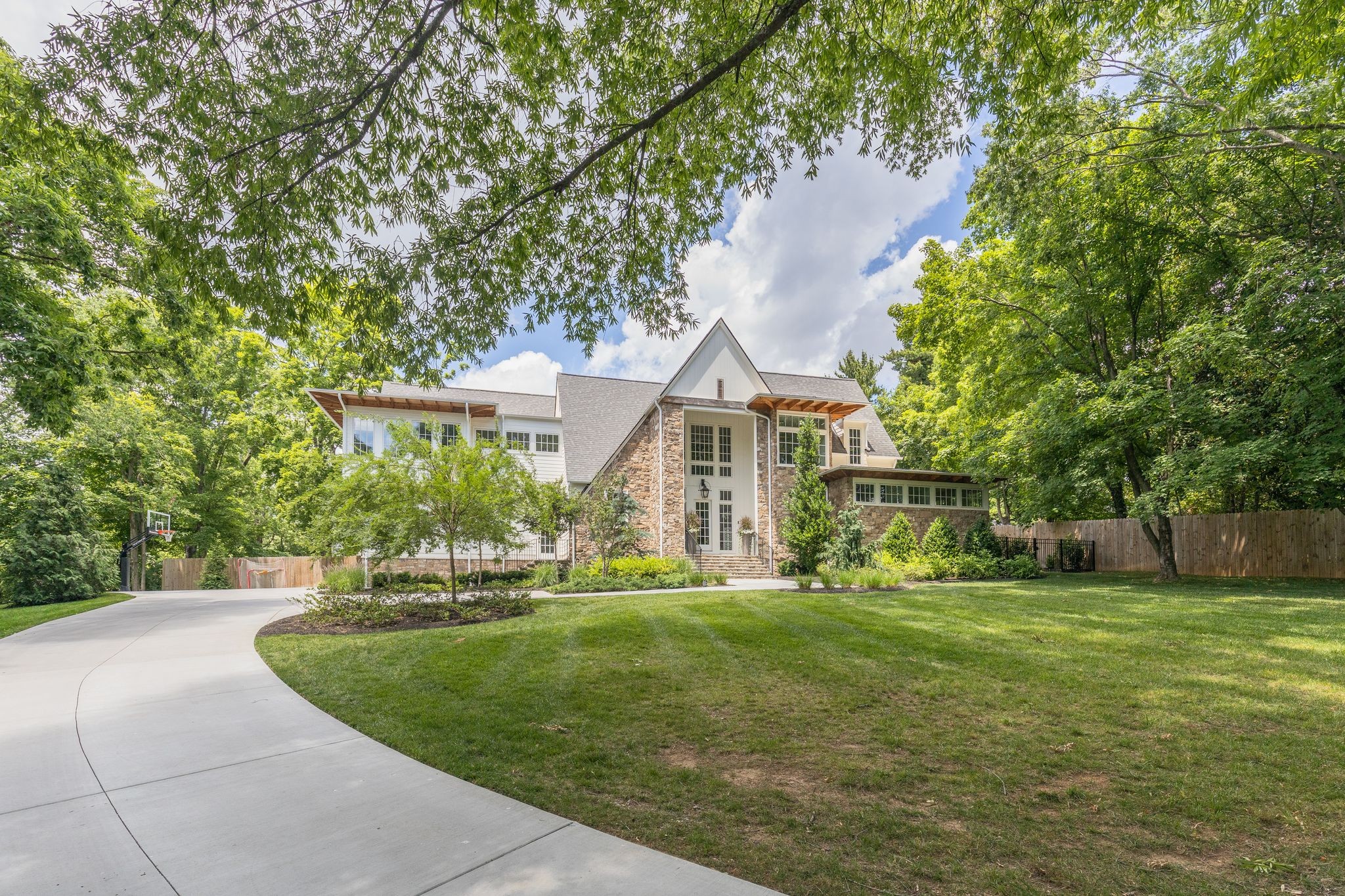 2402 Valley Brook Road Nashville, TN 37215 - Photo 67 of 75 a front view of a house with a yard