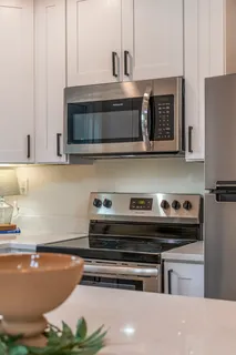 a view of dresser with wooden floor