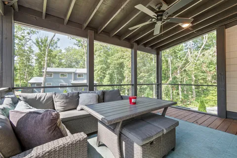 a view of house with a yard