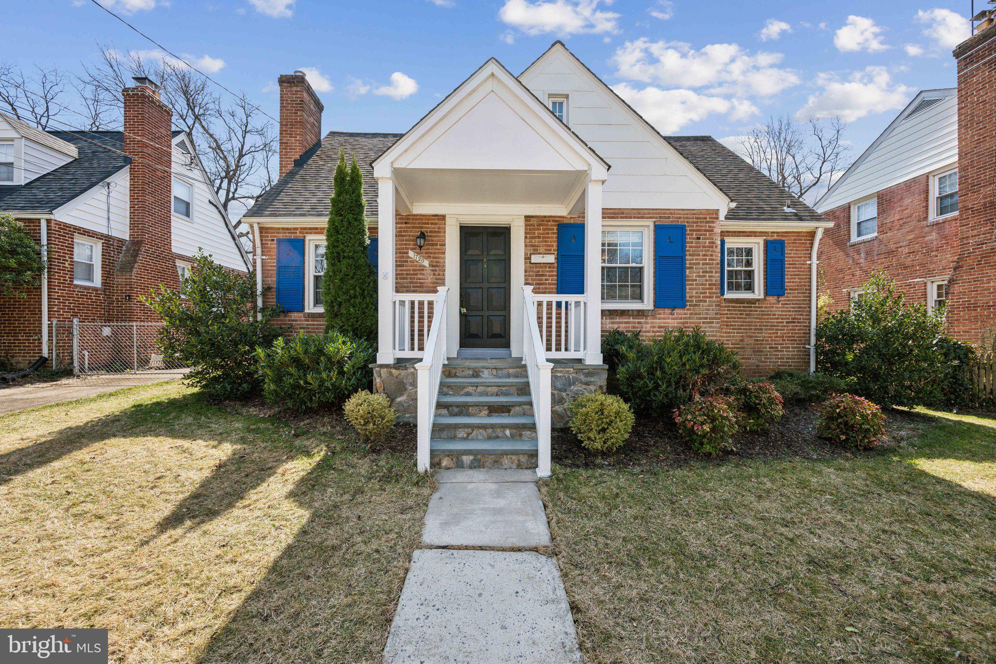 1720 Dublin Drive Silver Spring, MD 20902 - Photo 1 of 34 a front view of a house with garden