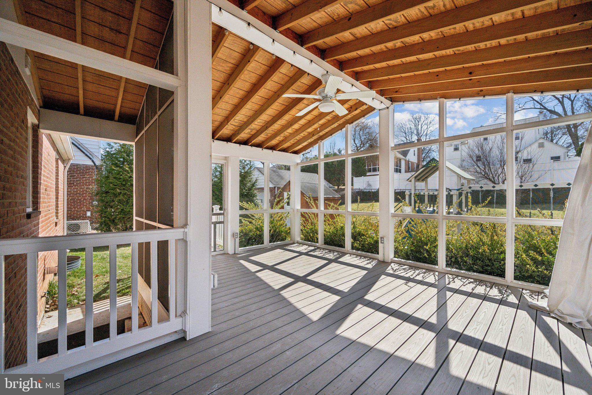 1720 Dublin Drive Silver Spring, MD 20902 - Photo 11 of 34 a view of porch with wooden floor in front of house