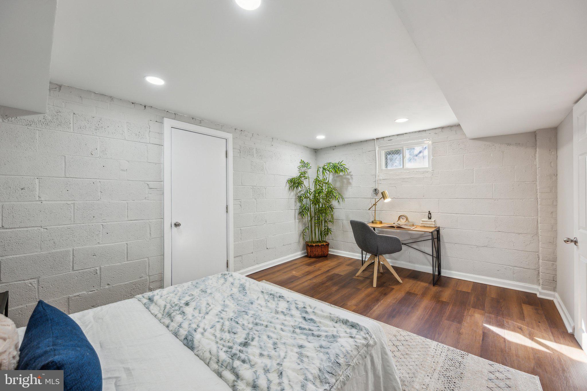 1720 Dublin Drive Silver Spring, MD 20902 - Photo 29 of 34 a workspace with furniture and wooden floor
