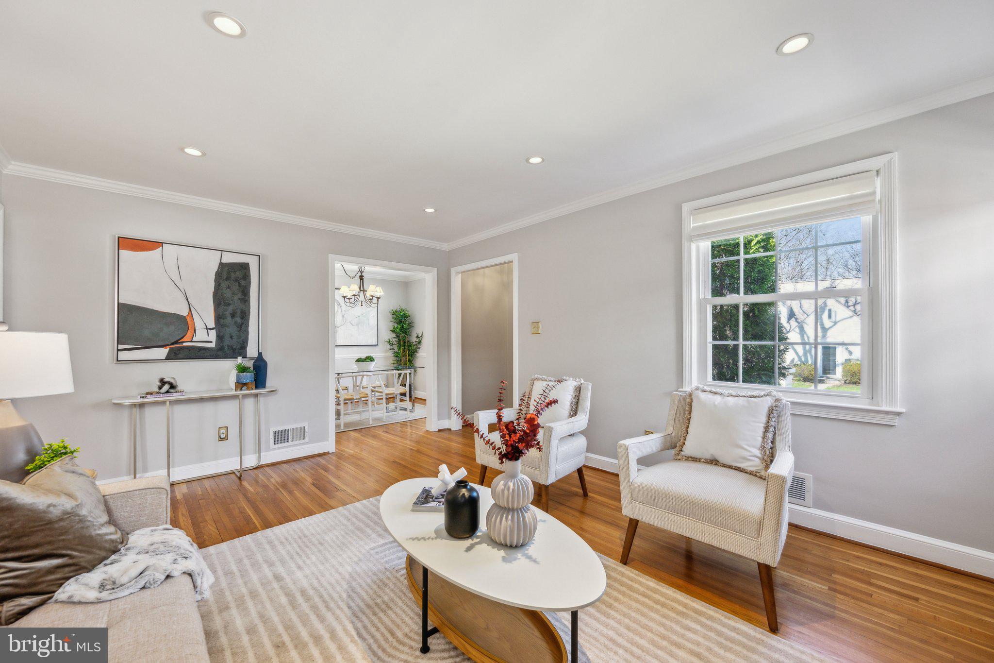 1720 Dublin Drive Silver Spring, MD 20902 - Photo 4 of 34 a living room with furniture and a large window