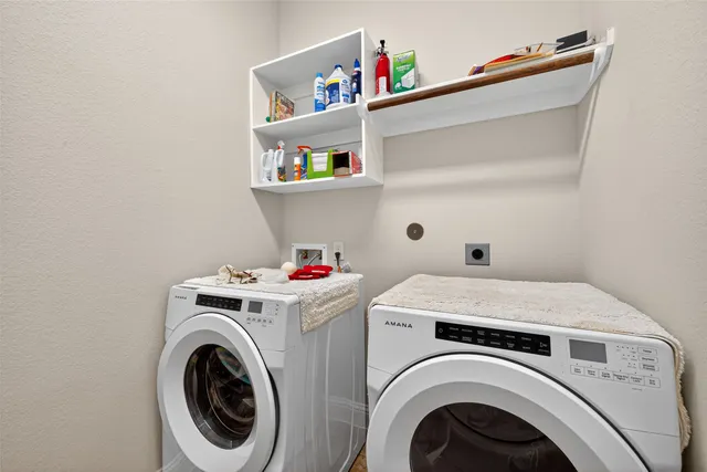 a bedroom with bed and a closet