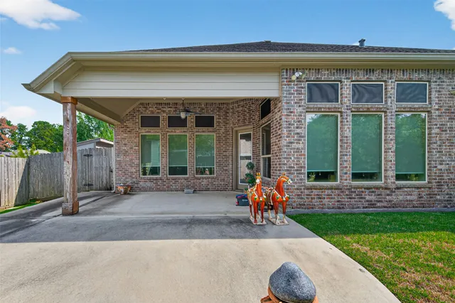 a view of a chair and table in the garden