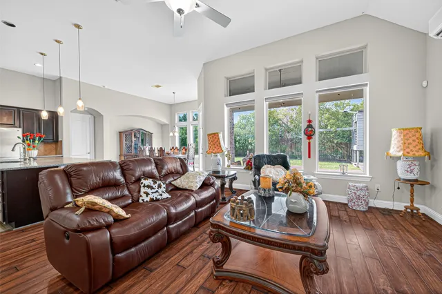 a kitchen with stainless steel appliances granite countertop a stove and a microwave