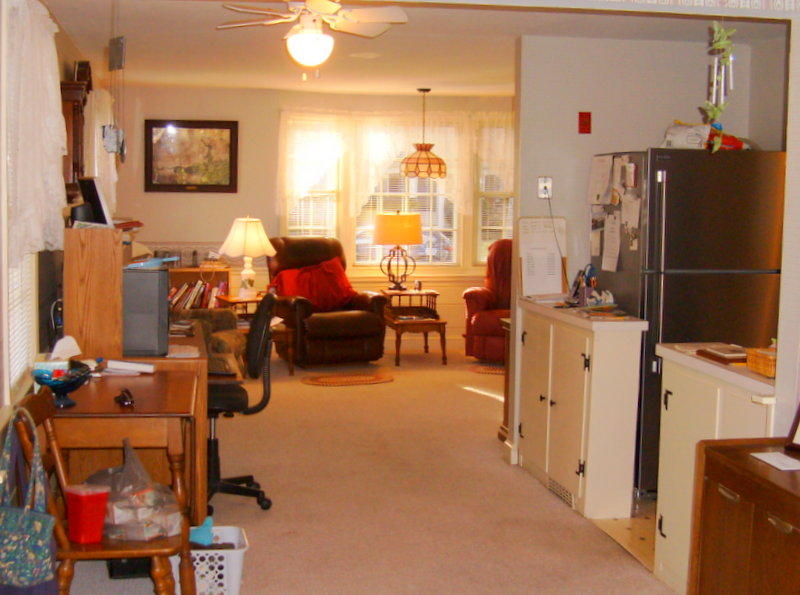136 Scudder Road Osterville, MA 02655 - Photo 7 of 14 a living room with furniture a window and a flat screen tv