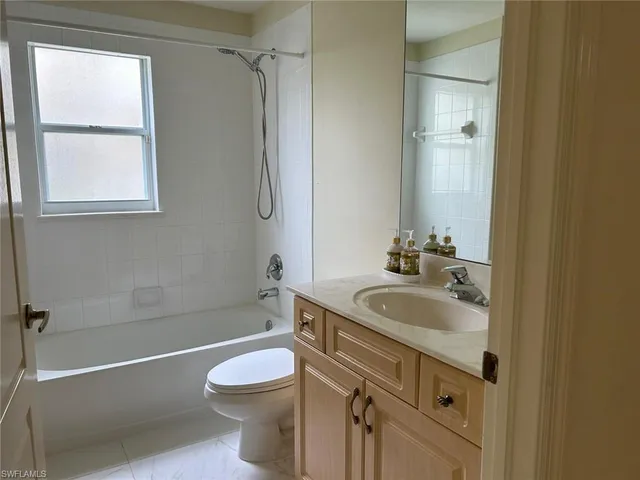 a bathroom with a sink a toilet and a bathtub