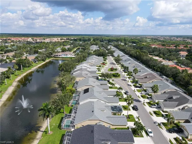 an aerial view of a city with lots of residential buildings