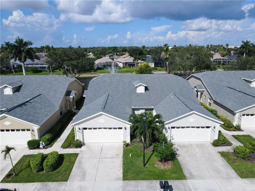 8220 Ibis Cove Circle, Unit B216 Naples, FL 34119 - Photo 30 of 34 an aerial view of a house