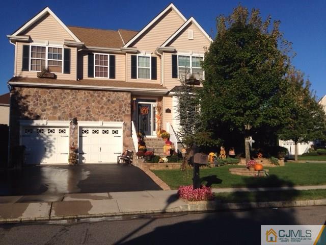 20 Carnation Road Monroe Township, NJ 08831 - Photo 1 of 23 a front view of a house with a yard