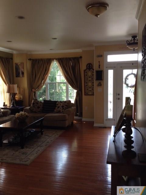 20 Carnation Road Monroe Township, NJ 08831 - Photo 2 of 23 a living room with furniture window and wooden floor