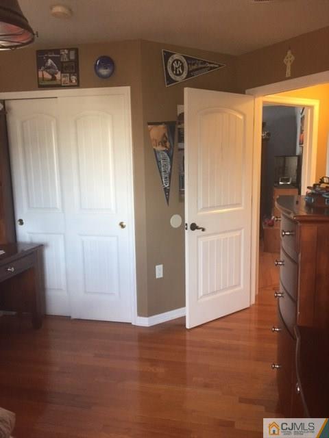 20 Carnation Road Monroe Township, NJ 08831 - Photo 11 of 23 a view of empty room with wooden floor