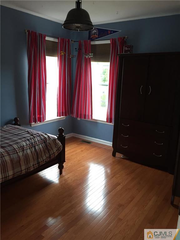 20 Carnation Road Monroe Township, NJ 08831 - Photo 13 of 23 a bedroom with a bed and window