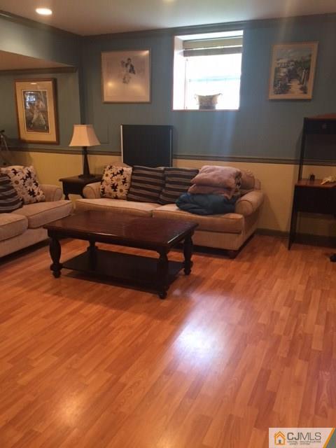 20 Carnation Road Monroe Township, NJ 08831 - Photo 22 of 23 a living room with furniture and a window