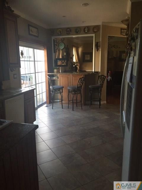 20 Carnation Road Monroe Township, NJ 08831 - Photo 9 of 23 a view of a dining room with furniture window and outside view