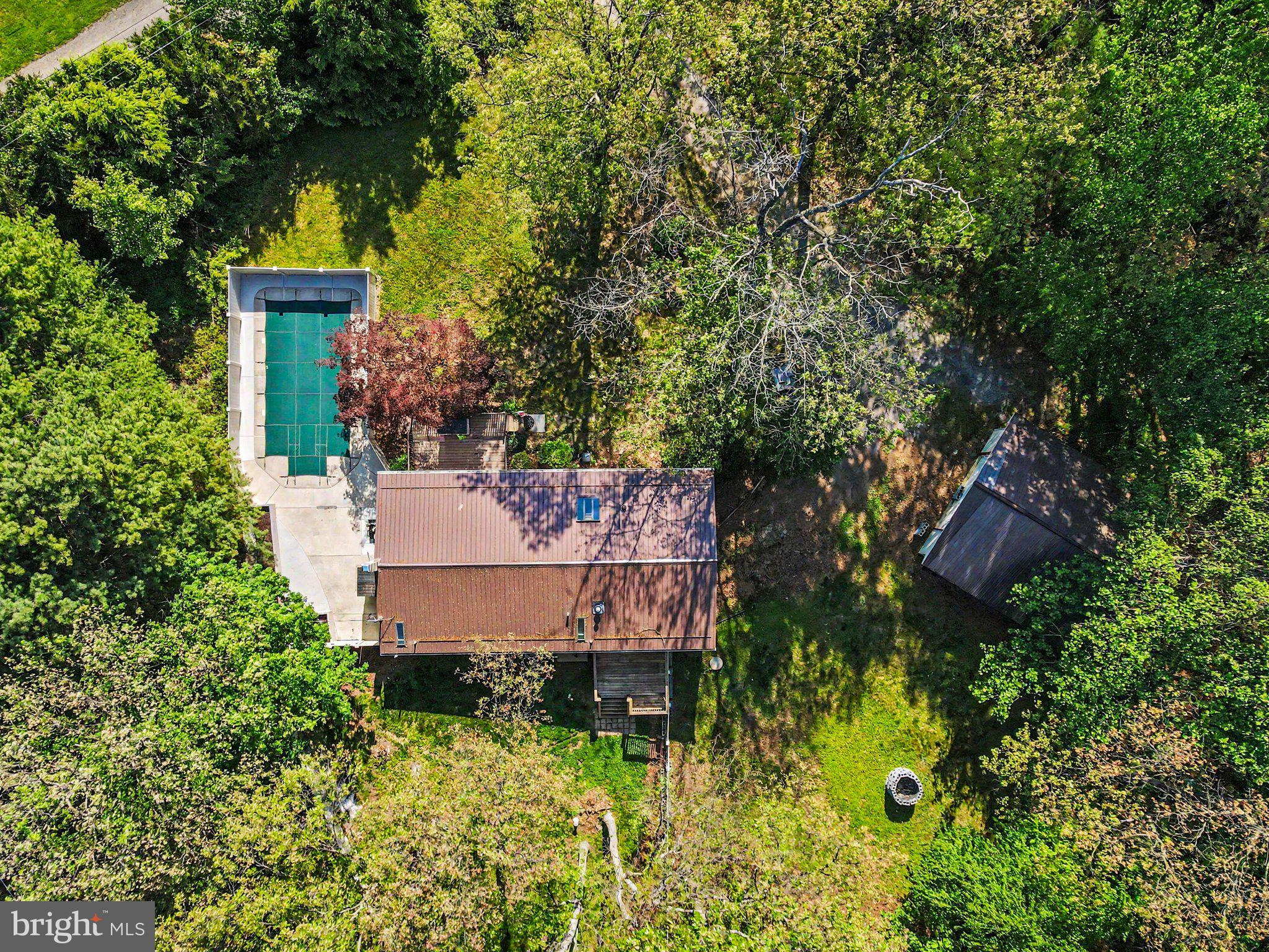 46 Pisgah Rest Shermans Dale, PA 17090 - Photo 4 of 36 an aerial view of a house with a yard basket ball court and outdoor seating