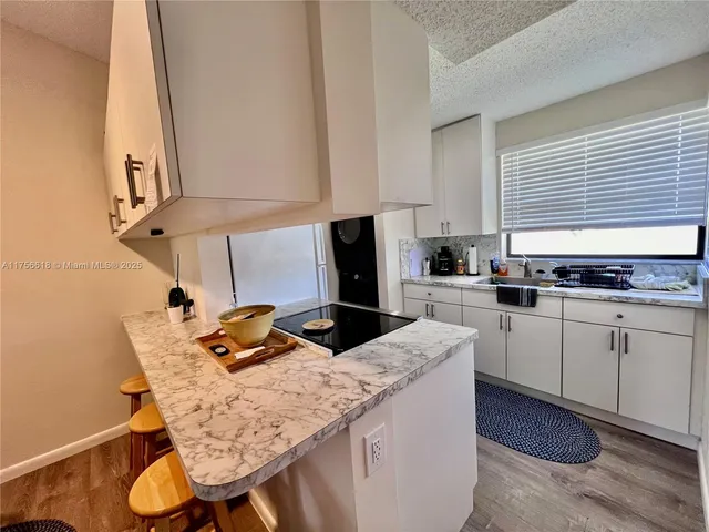 a bed room with a bed and a window