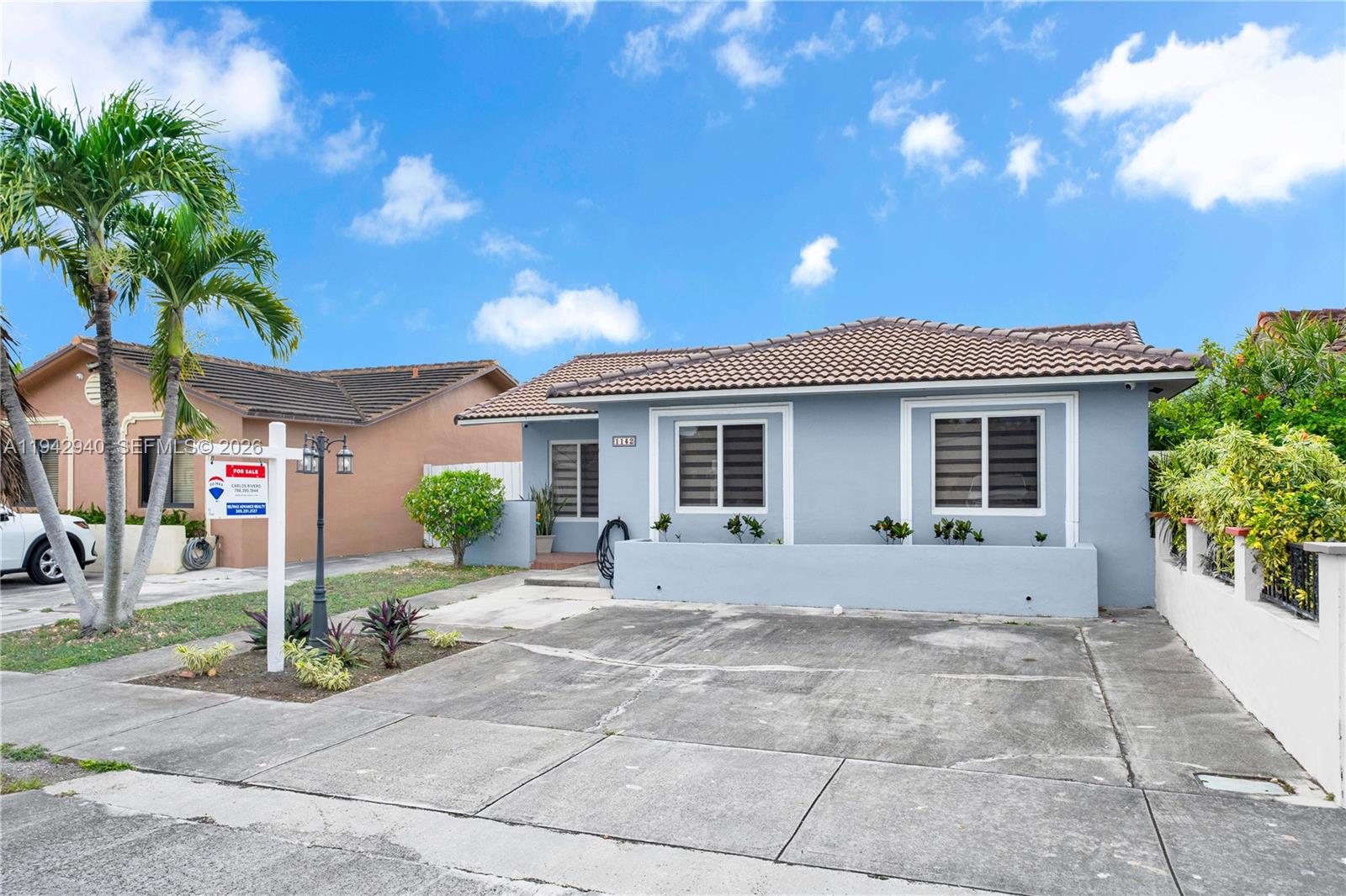 1142 Southwest 138th Court Miami, FL 33184 - Photo 3 of 50 a view of a house with a patio