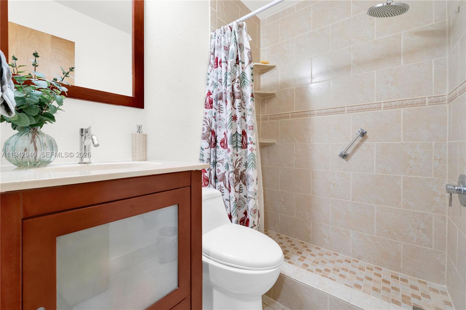 1142 Southwest 138th Court Miami, FL 33184 - Photo 31 of 50 a bathroom with a sink toilet and shower