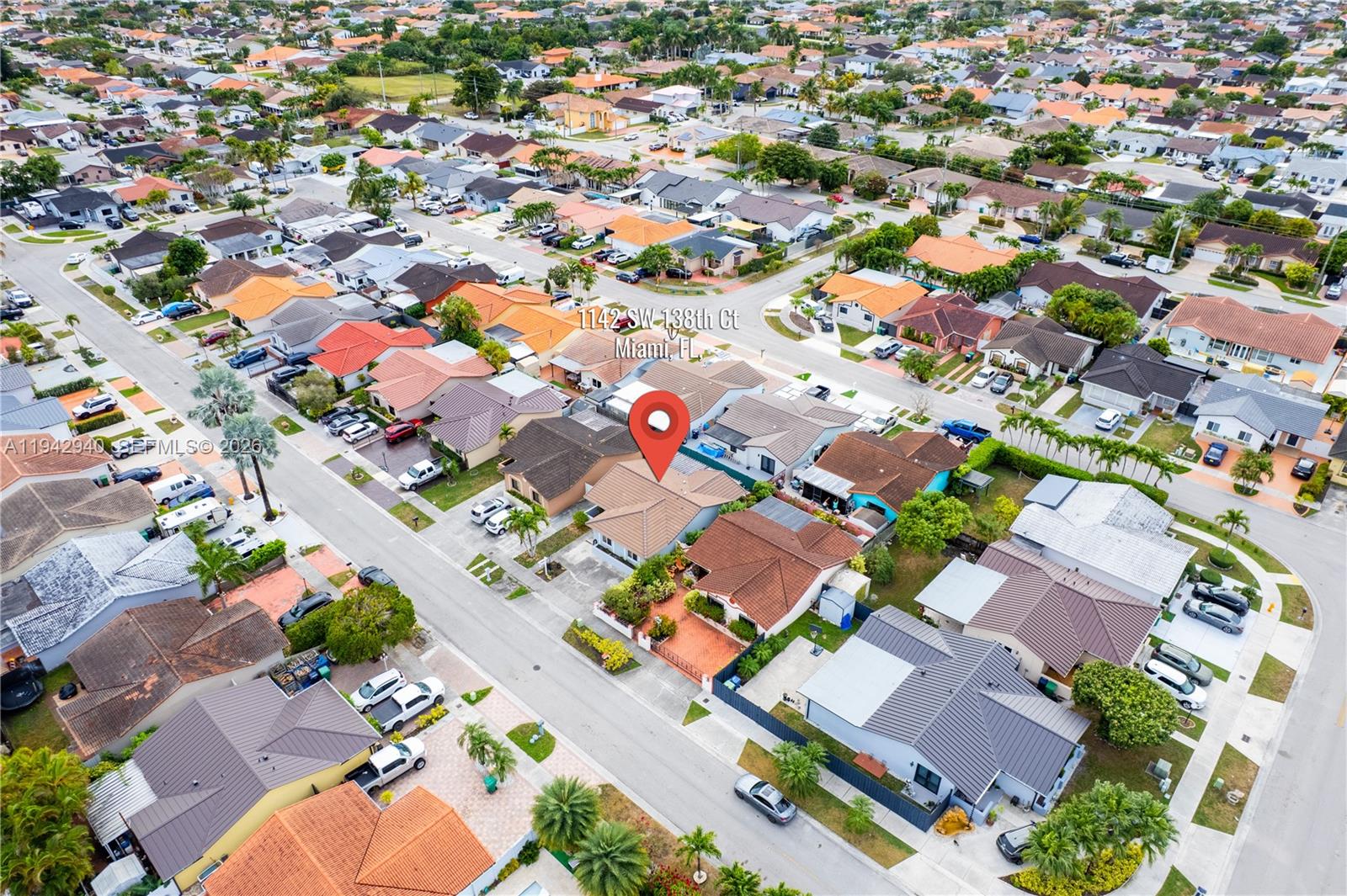 1142 Southwest 138th Court Miami, FL 33184 - Photo 41 of 50 an aerial view of residential houses with street