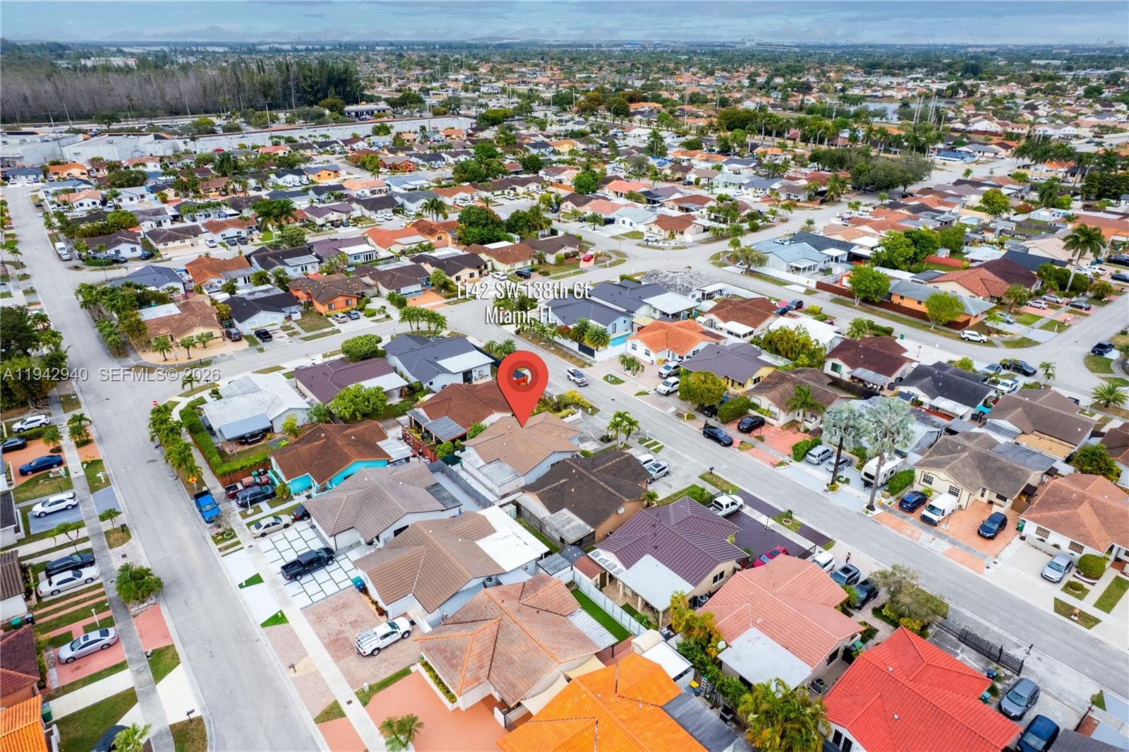 1142 Southwest 138th Court Miami, FL 33184 - Photo 47 of 50 an aerial view of multiple house with yard